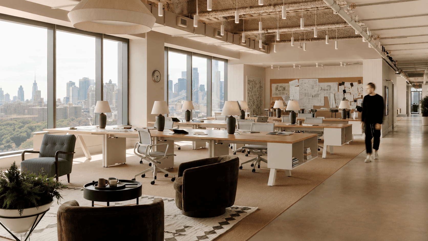 Open-plan workspace with city view where Dynamic Works teams operate